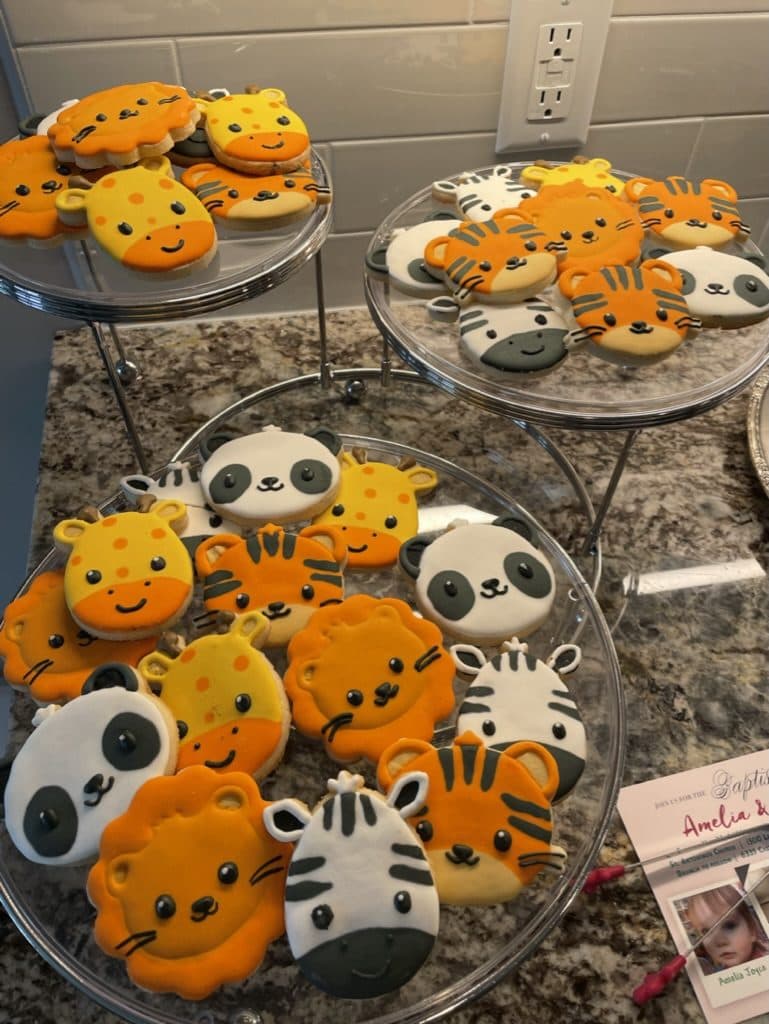 Safari animal cookies with lions, tigers, pandas, and zebras