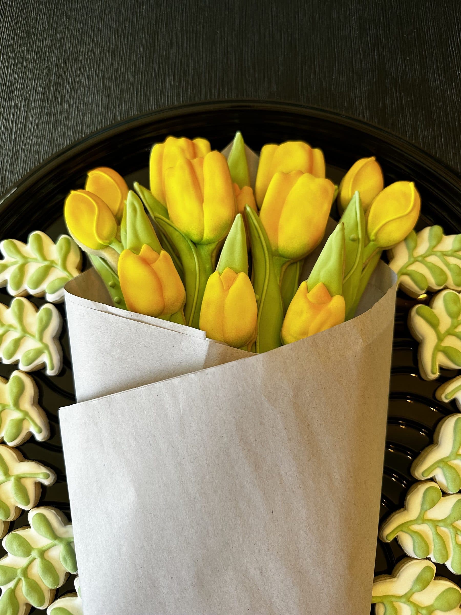 Bouquet of yellow tulip cookies wrapped in kraft paper